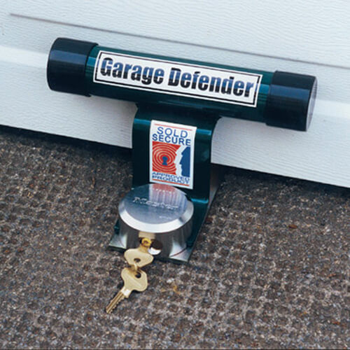 Garage defender barrier