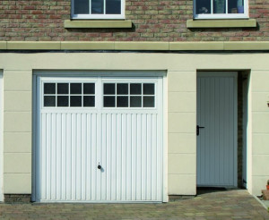 White panelled garage door and front door