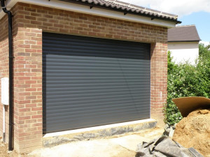Large graphite roller garage doors