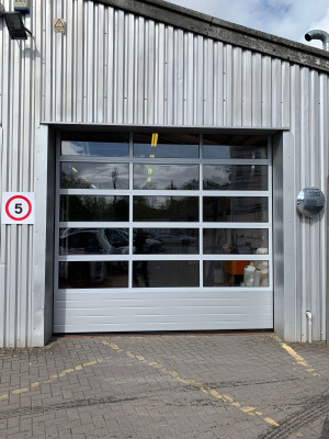 Garage doors with windows up and over